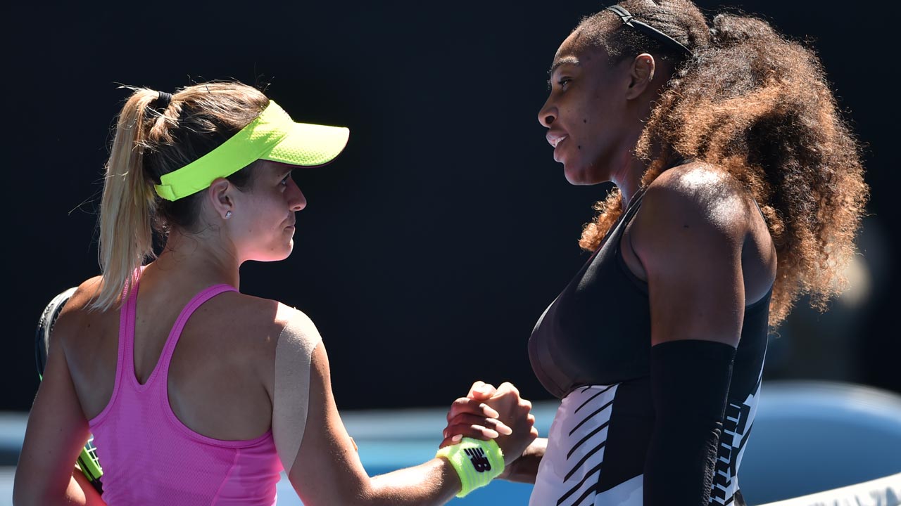 Serena Williams of the US (R) shakes hands with Nicole Gibbs of the US after winning their women's singles third round match on day six of the Australian Open tennis tournament in Melbourne on January 21, 2017. PHOTO: PETER PARKS / AFP