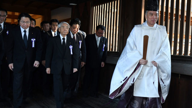 Dozens of Japan lawmakers visit controversial war shrine | The Guardian ...