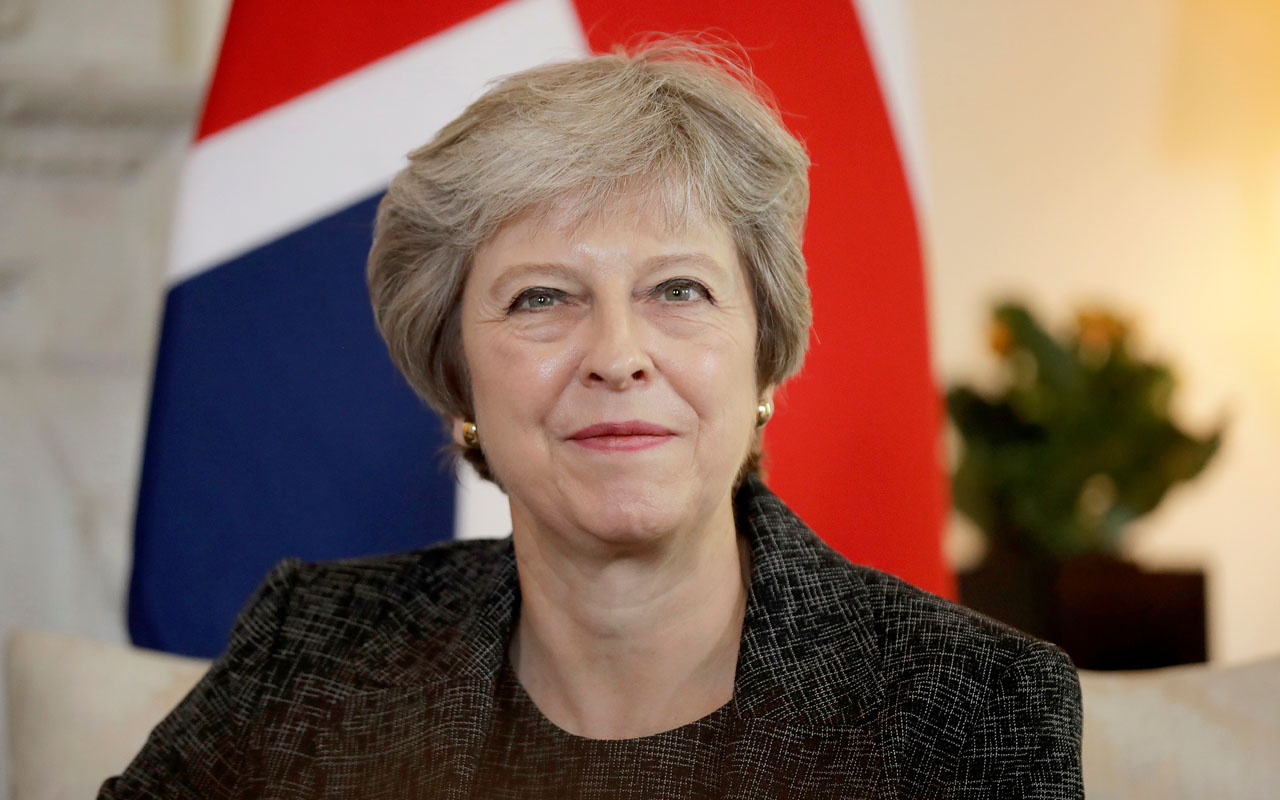 s prime minister theresa may / afp photo / pool / matt dunham