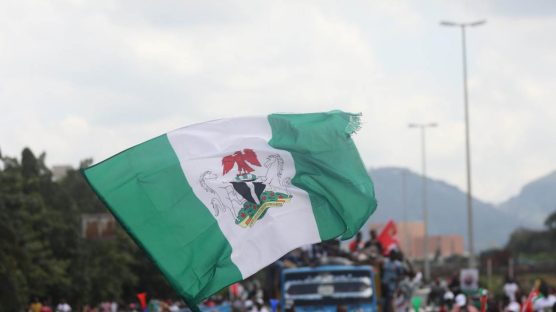Nigeria's flag (Photo by Kola Sulaimon / AFP)