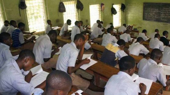 FILE PHOTO: Students writing Neco exams using paper-based-test