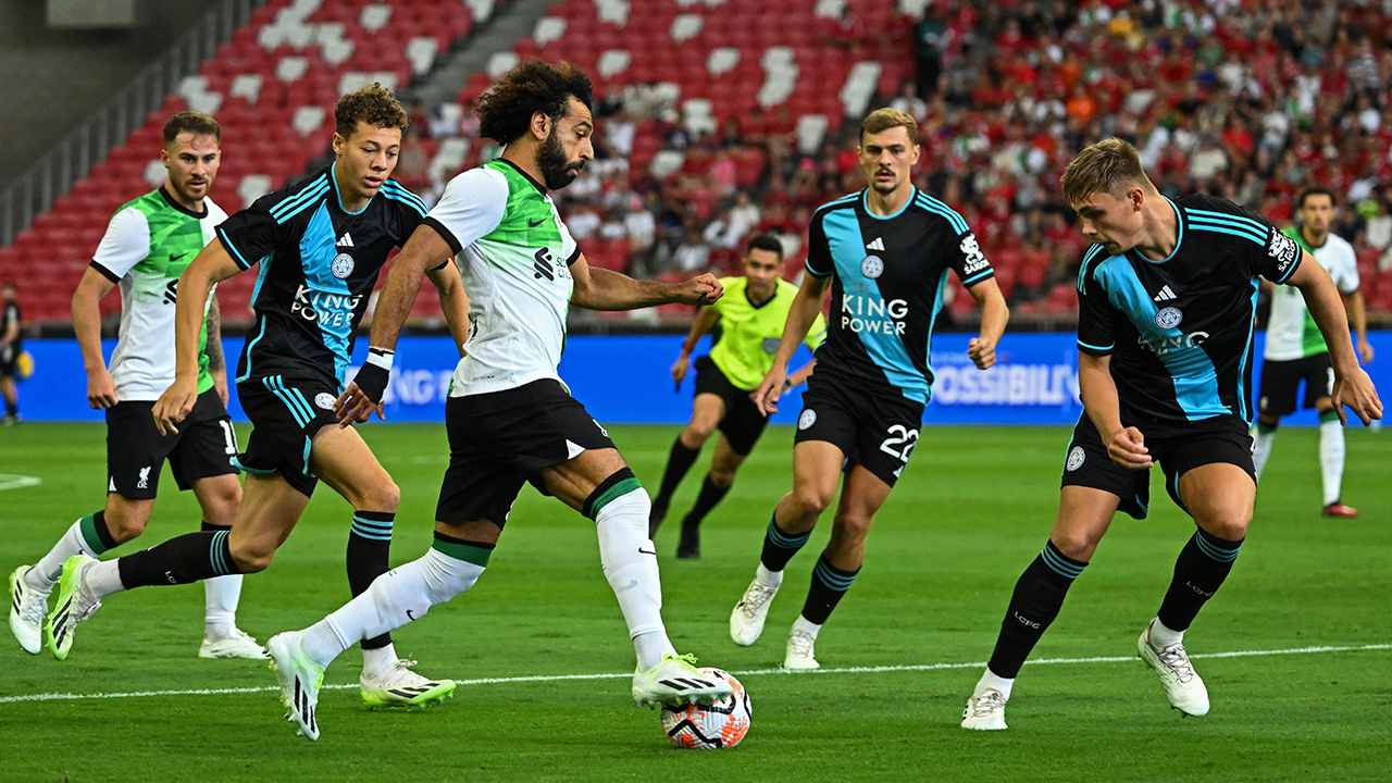 Salah models Liverpool's 'Super Eagles' Green and white away kit