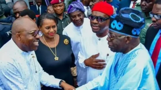 President Bola Tinubu and Siminalayi Fubara shake hands