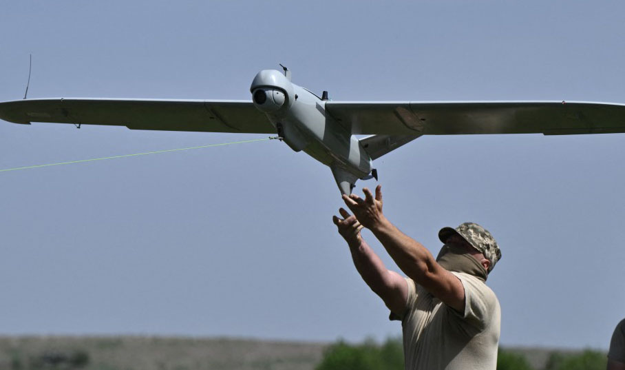 Ukrainian servicemen of the 22nd Brigade launch a Leleka reconnaissance UAV drone near Chasiv Yar, Donetsk region, on April 27, 2024, amid the Russian invasion of Ukraine. (Photo by Genya SAVILOV / AFP)