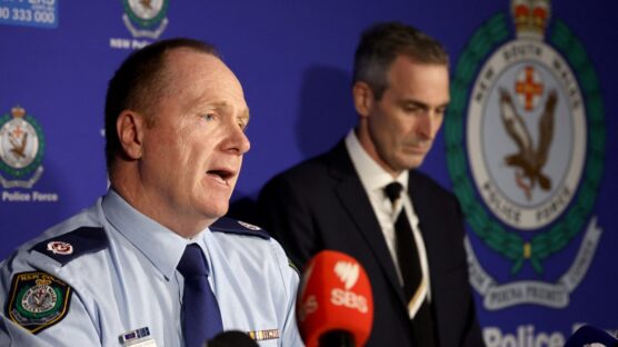 New South Wales assistant police commissioner Michael Fitzgerald (L) speaks as he stands next to Organised Crime Squad Commander Peter Faux, during a press conference in Sydney on May 17, 2024. - Three footballers in Australia's top-tier A-League were arrested on May 17, in a betting probe, accused of taking "corrupt" payments from an organised crime figure to manipulate games. (Photo by DAVID GRAY / AFP)