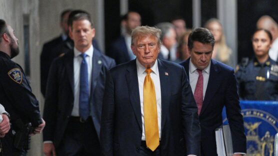 Former US President and Republican presidential candidate Donald Trump, with attorney Todd Blanche (R), walks toward the press to speak after the 12 jurors in his criminal trial began deliberating at Manhattan Criminal Court in New York City on May 29, 2024. (Photo by Curtis Means / POOL / AFP)