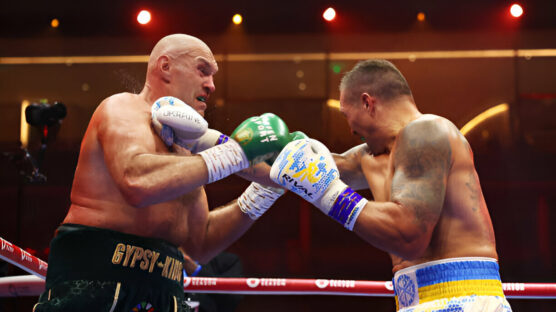 Oleksandr Usyk punches Tyson Fury during the IBF, WBA, WBC, WBO and Undisputed Heavyweight titles' fight between Tyson Fury and Oleksandr Usyk at Kingdom Arena on May 18, 2024 in Riyadh, Saudi Arabia. (Photo by AFP)