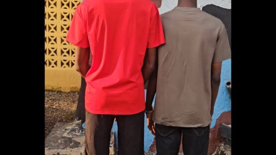 An uncle (left) and his nephew being paraded by the Delta State Police Command for self-kidnap and extortion