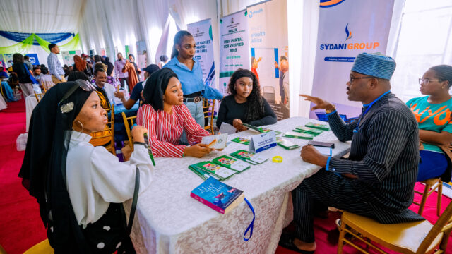 A cross-section photograph of students and employer-partners interacting during the 5th Annual Career Fair at Nile University of Nigeria.