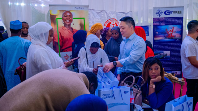 A cross-section photograph of students and employer-partners interacting during the 5th Annual Career Fair at Nile University of Nigeria.