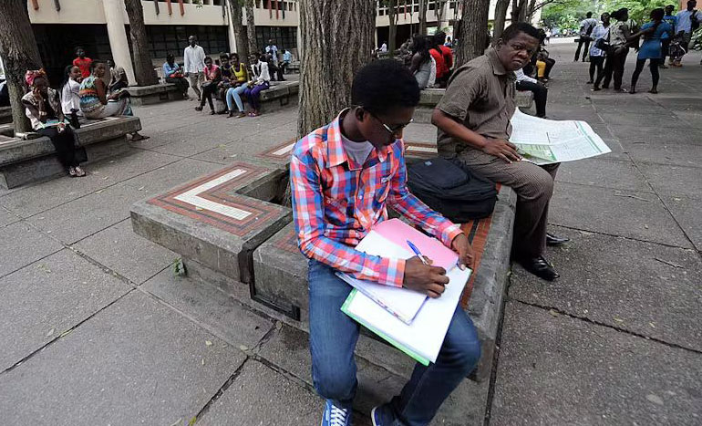 NELFUND --A student going through his work at the University of Lagos, Nigeria. Pius Utomi Ekpei/AFP/Getty