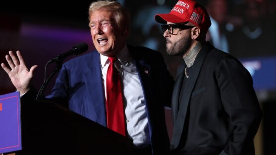 LAS VEGAS, NEVADA - SEPTEMBER 13: Republican presidential nominee, former U.S. President Donald Trump, (L) appears on stage with recording artist Nicky Jam during a campaign rally at The Expo at World Market Center Las Vegas on September 13, 2024 in Las Vegas, Nevada. With 53 days before election day, Former President Trump continues to campaign. Justin Sullivan/Getty Images/AFP (Photo by JUSTIN SULLIVAN / GETTY IMAGES NORTH AMERICA / Getty Images via AFP)