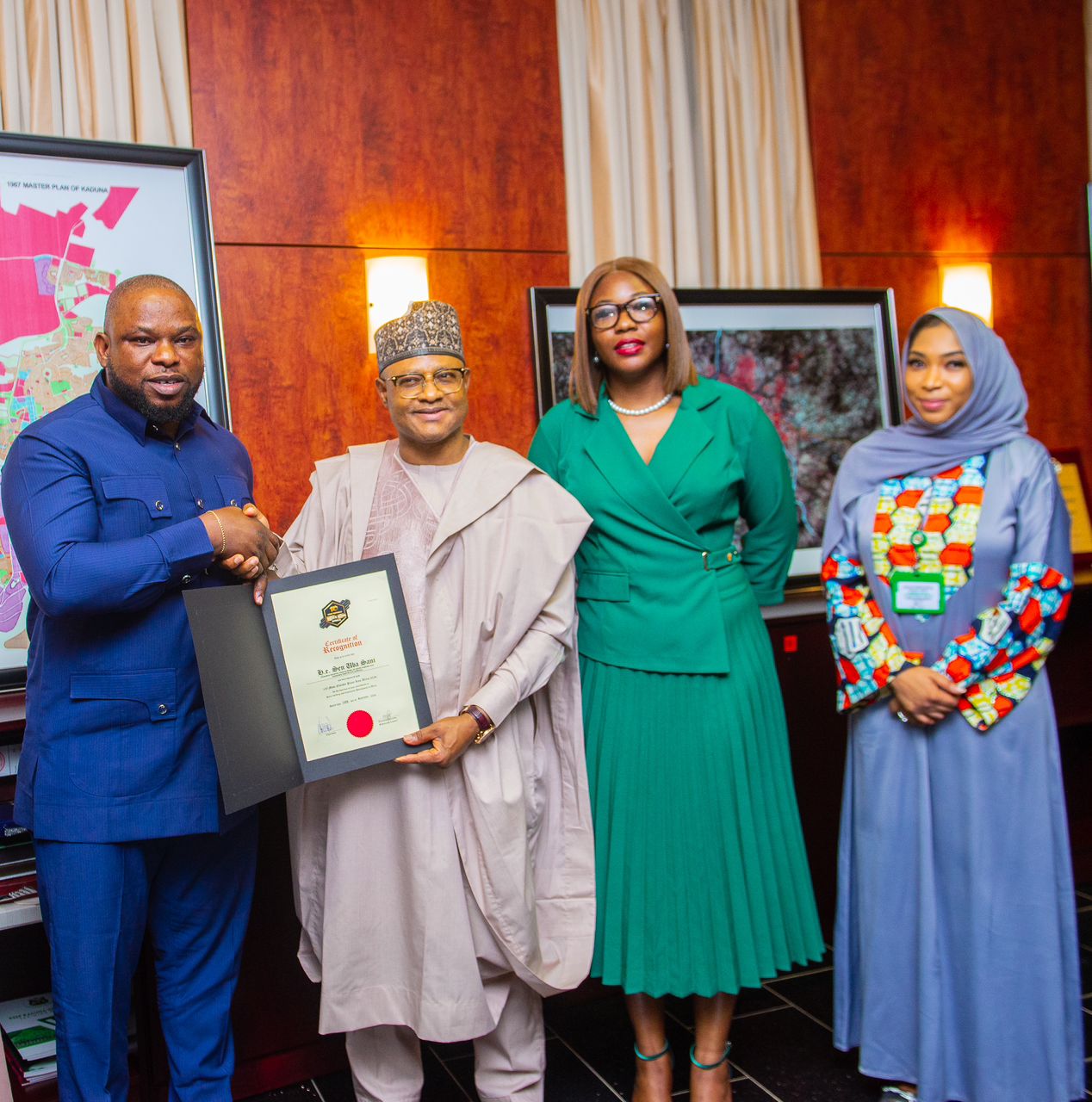 Governor Uba Sani of Kaduna State (second left) receives his 100 Most Notable Peace Icons Africa honour