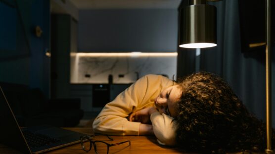 Lady sleeping on a table