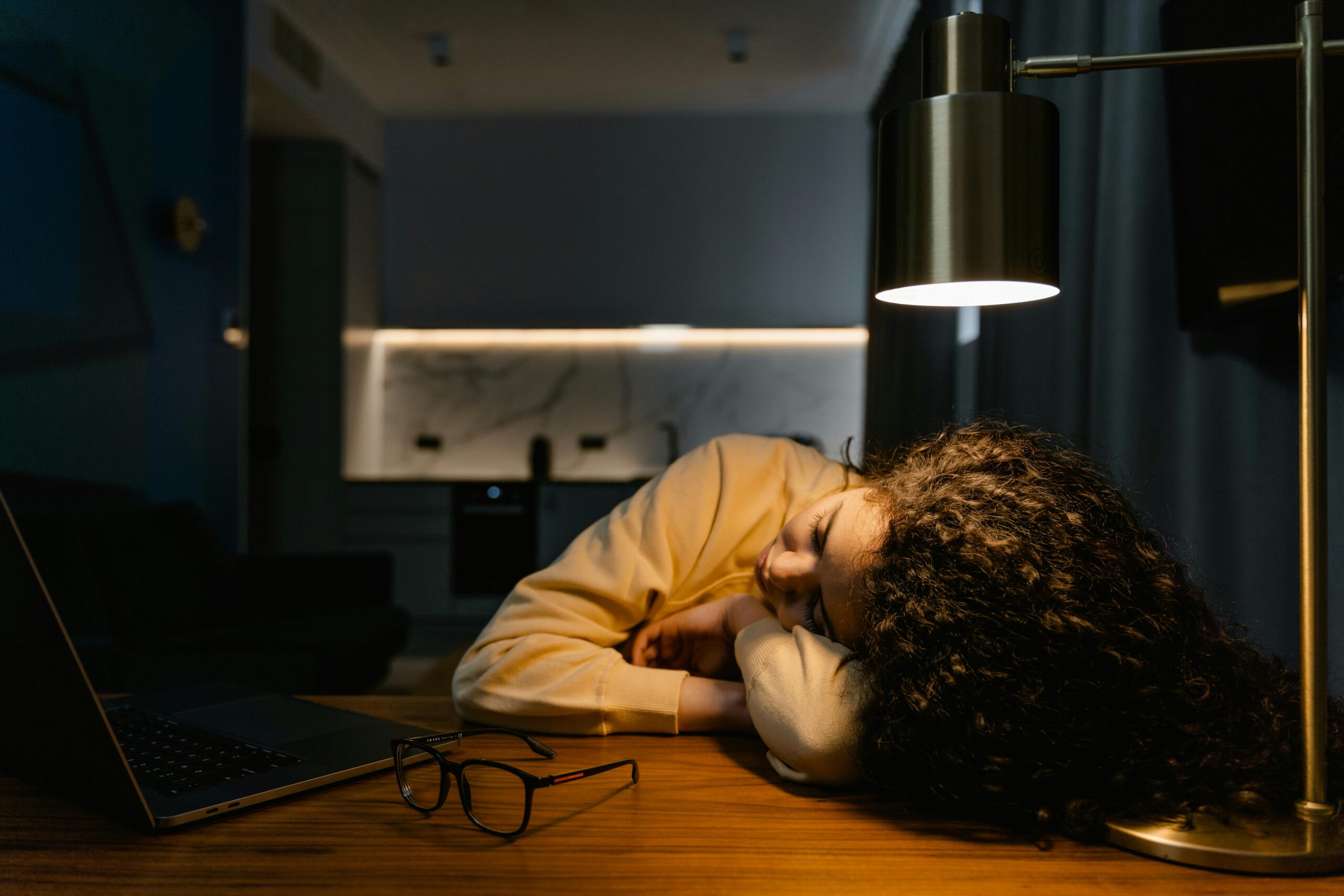 Lady sleeping on a table