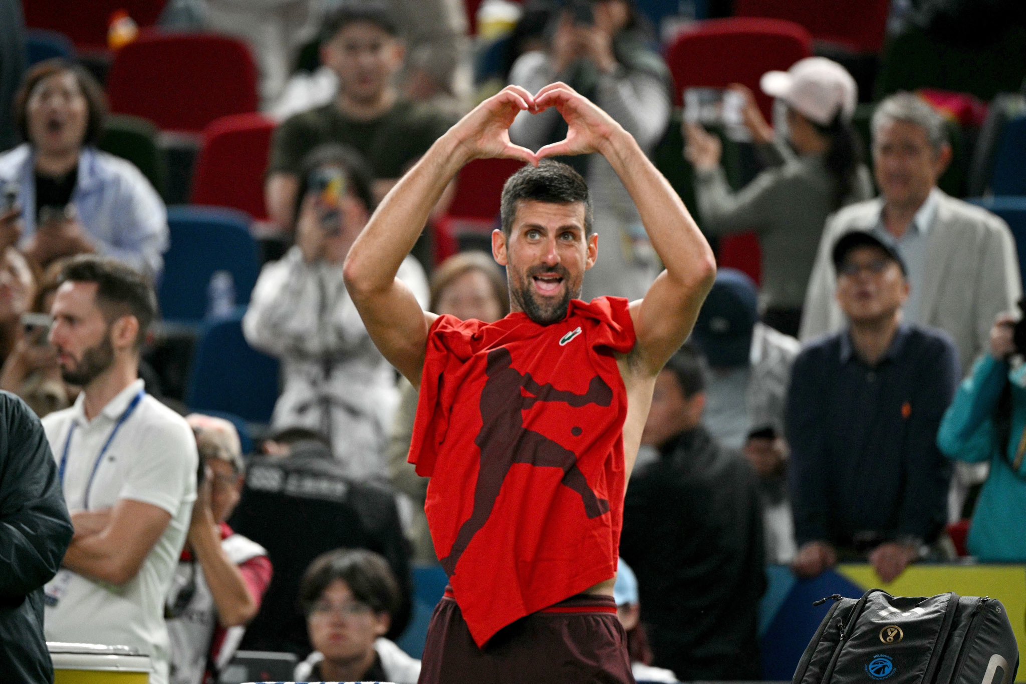 Novak Djokovic celebrates after beating Taylor Fritz to set up a blockbuster Shanghai Masters final with world number one, Jannik Sinner