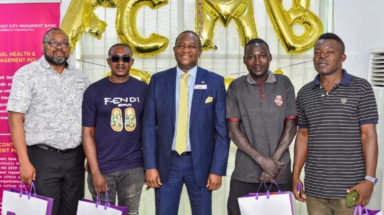 Mr. Diran Olojo, Group Head, Corporate Affairs, engaged with customers and showed appreciation for their support at the bank's Oniru branch. Pictured with Mr. Olojo are Mr. Ndubuisi Okechukwu, Mr. Bernard Uzoibiam, Mr. Ali Salisu and Mr. Simeon Adoyi.