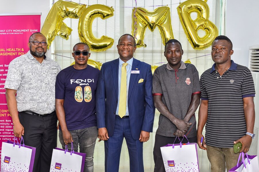 Mr. Diran Olojo, Group Head, Corporate Affairs, engaged with customers and showed appreciation for their support at the bank's Oniru branch. Pictured with Mr. Olojo are Mr. Ndubuisi Okechukwu, Mr. Bernard Uzoibiam, Mr. Ali Salisu and Mr. Simeon Adoyi. 