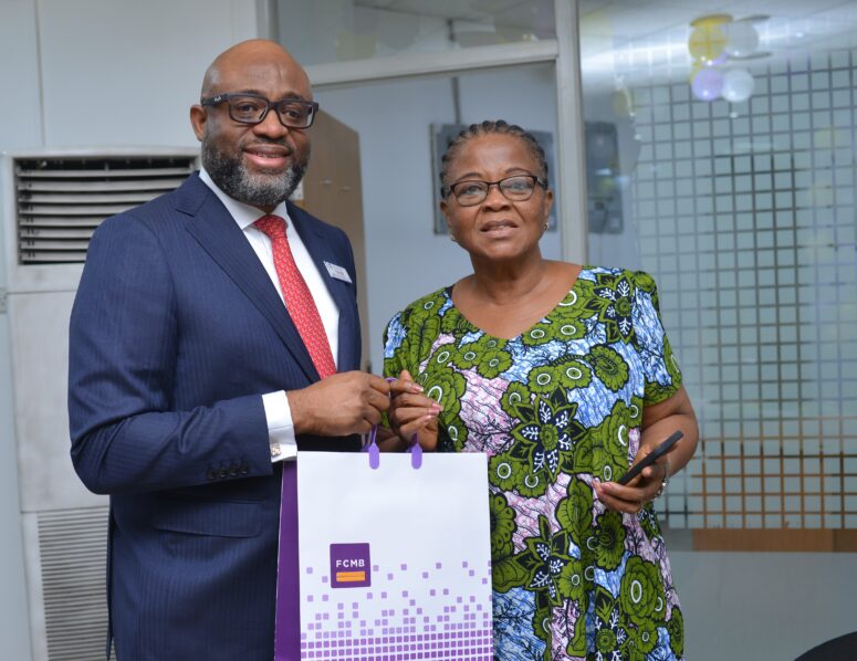 Mr. Gerald Ikem, Divisional Head, Treasury & International Banking, engaged with customers and showed appreciation for their support. At the bank's Adeola Odeku branch in Lagos, he is pictured with a customer, Mrs. Felicia Nlemona.