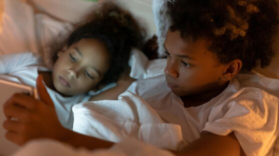 Children sleeping and viewing the screen