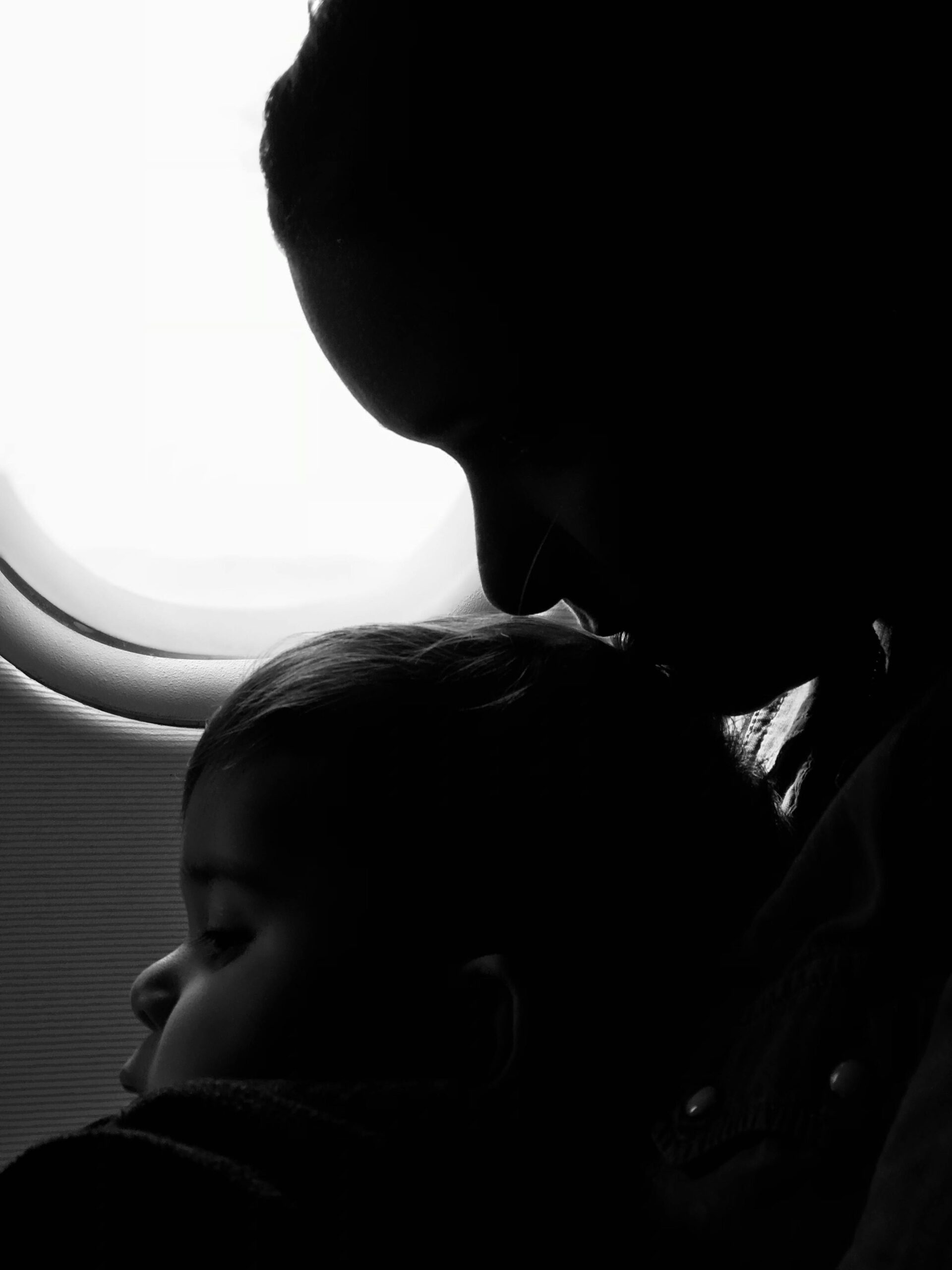 A mother and son on a flight