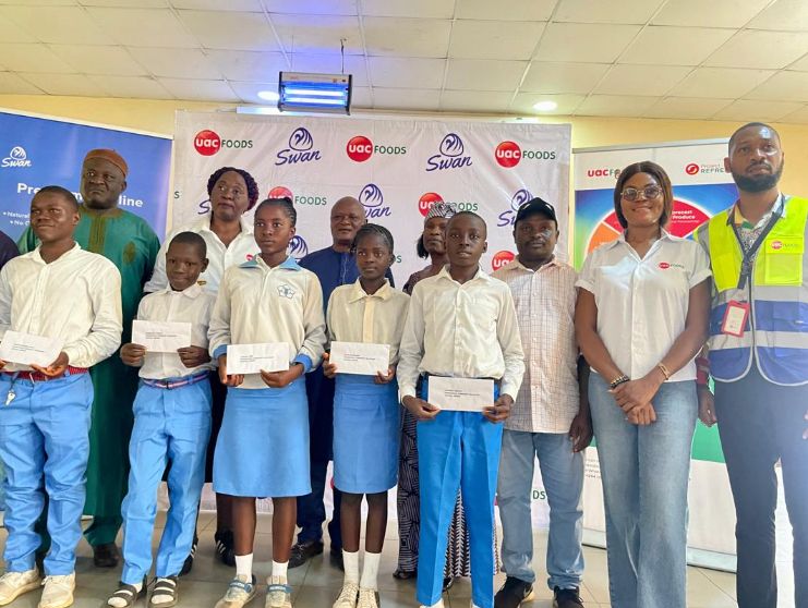 Scholarship recipients with the Chairman Community Relations Committee, Kerang Development Association Chairman, and UAC Foods Limited’s Staff.