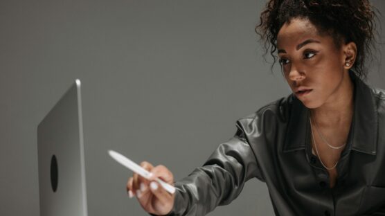 A lady working with laptop on her front