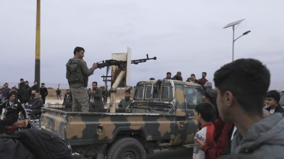 Syrian Kurdish gunmen control the area around Qamishli's airport in northeastern Syria on December 8, 2024, following the fall of the capital Damascus to anti-government fighters. - Islamist-led rebels declared that they have taken Damascus in a lightning offensive on December 8, sending President Bashar al-Assad fleeing and ending five decades of Baath rule in Syria. (Photo by Delil souleiman / AFP)