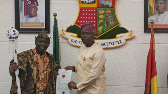 Alaafin of Oyo, Prince Abimbola Owoade, receiving staff of office from Governor Seyi Makinde