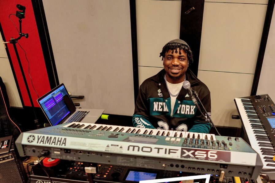 Nigerian music producer Tobbydaniels shares his inspiring journey from church keyboardist to collaborating with top artists like Kizz Daniel and Moses Bliss, showcasing his passion and resilience.